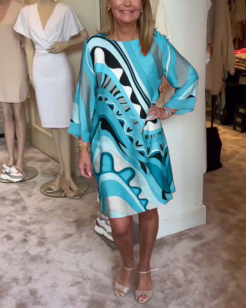 Sophia™ - Chic Floral Midi Dress with Round Neck