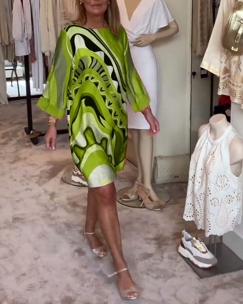 Sophia™ - Chic Floral Midi Dress with Round Neck